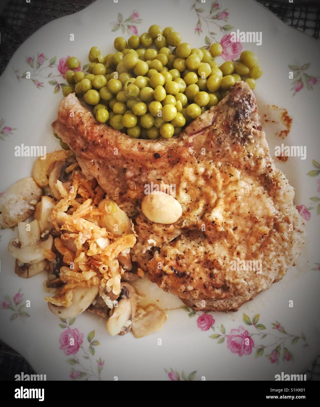 Home cooked pork chop meal, USA - Smartphone Captured Stock Image
