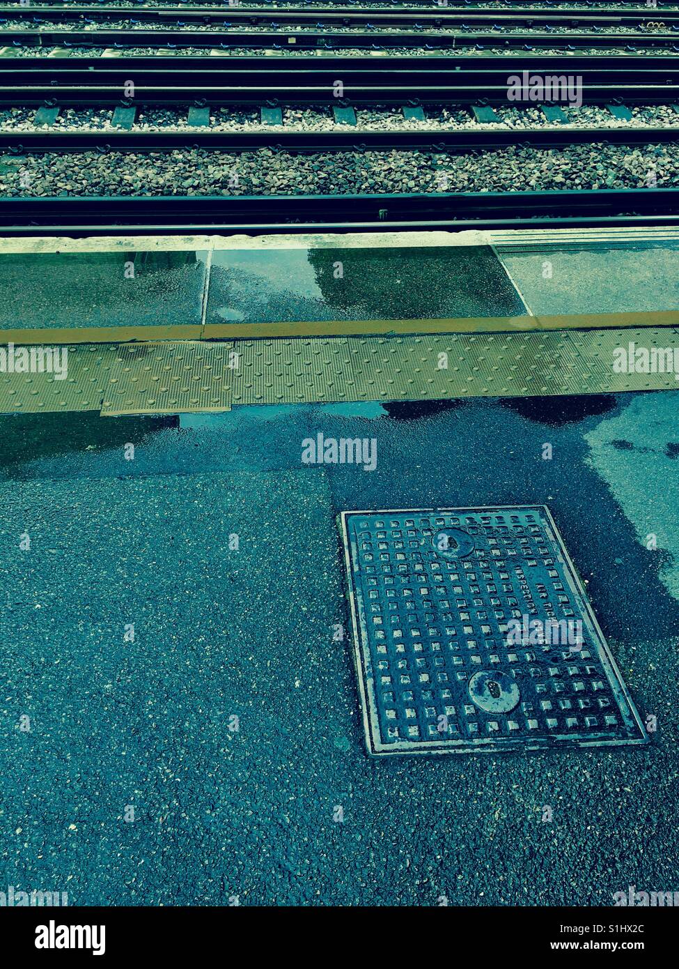 Rail platform and tracks in London in England - Smartphone Captured Stock Image