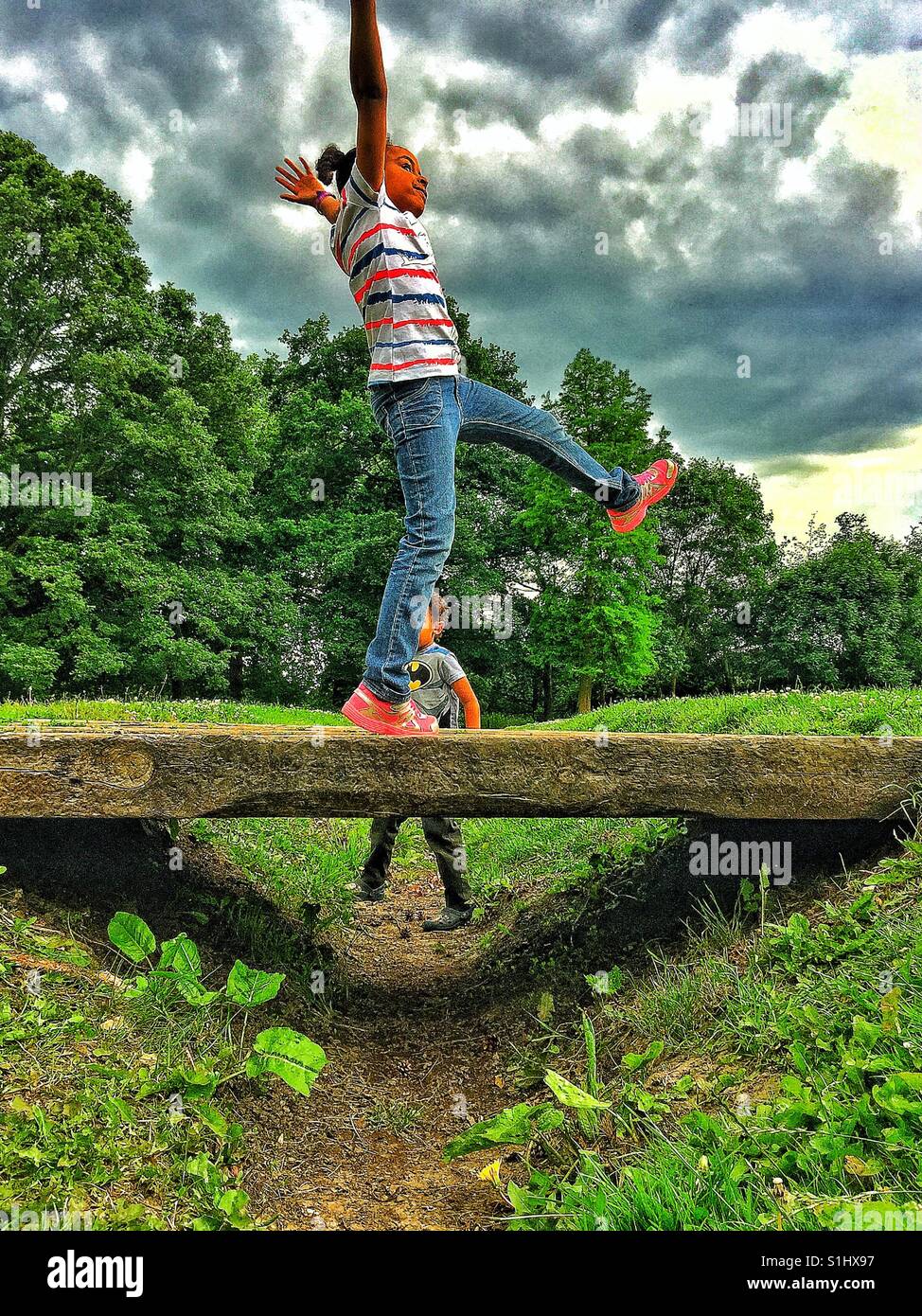 Children playing outside Stock Photo Alamy