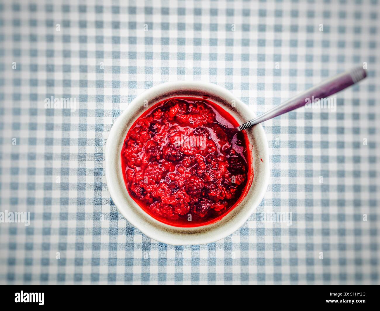 Cooked raspberries and black currents Stock Photo - Alamy