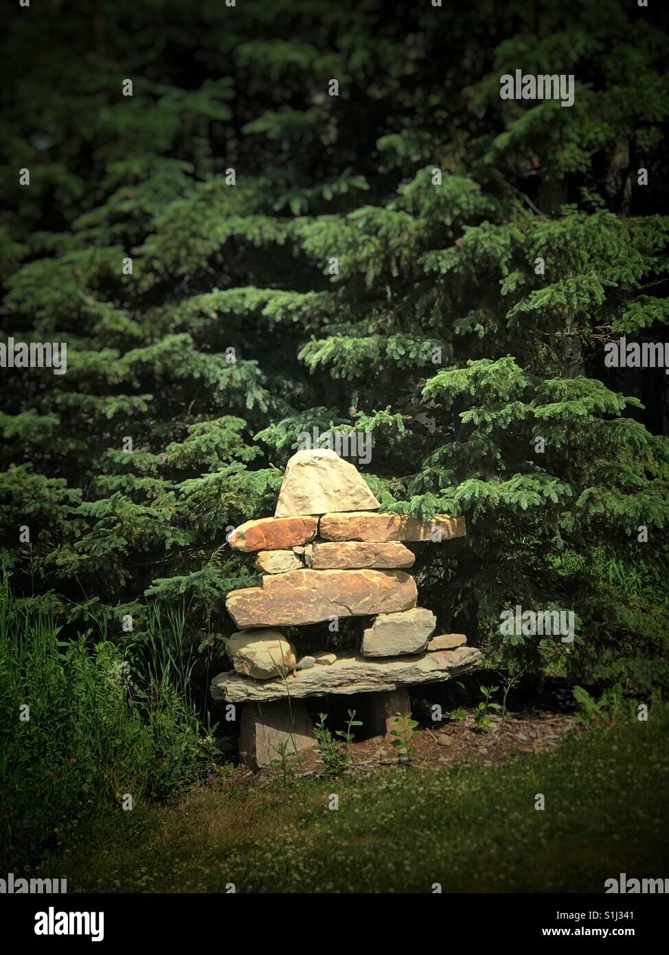 Inukshuk welcomes visitors. Alberta, Canada. - Smartphone Captured Stock Image