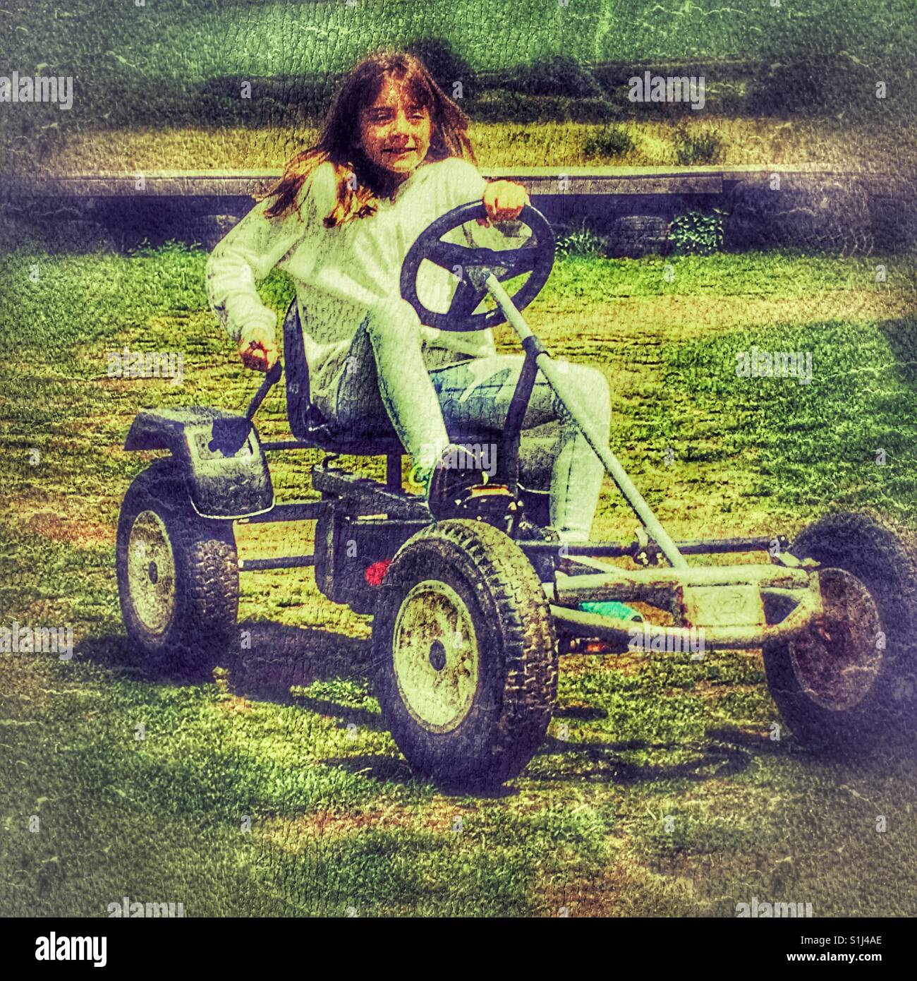 Young girl on a gokart Stock Photo Alamy