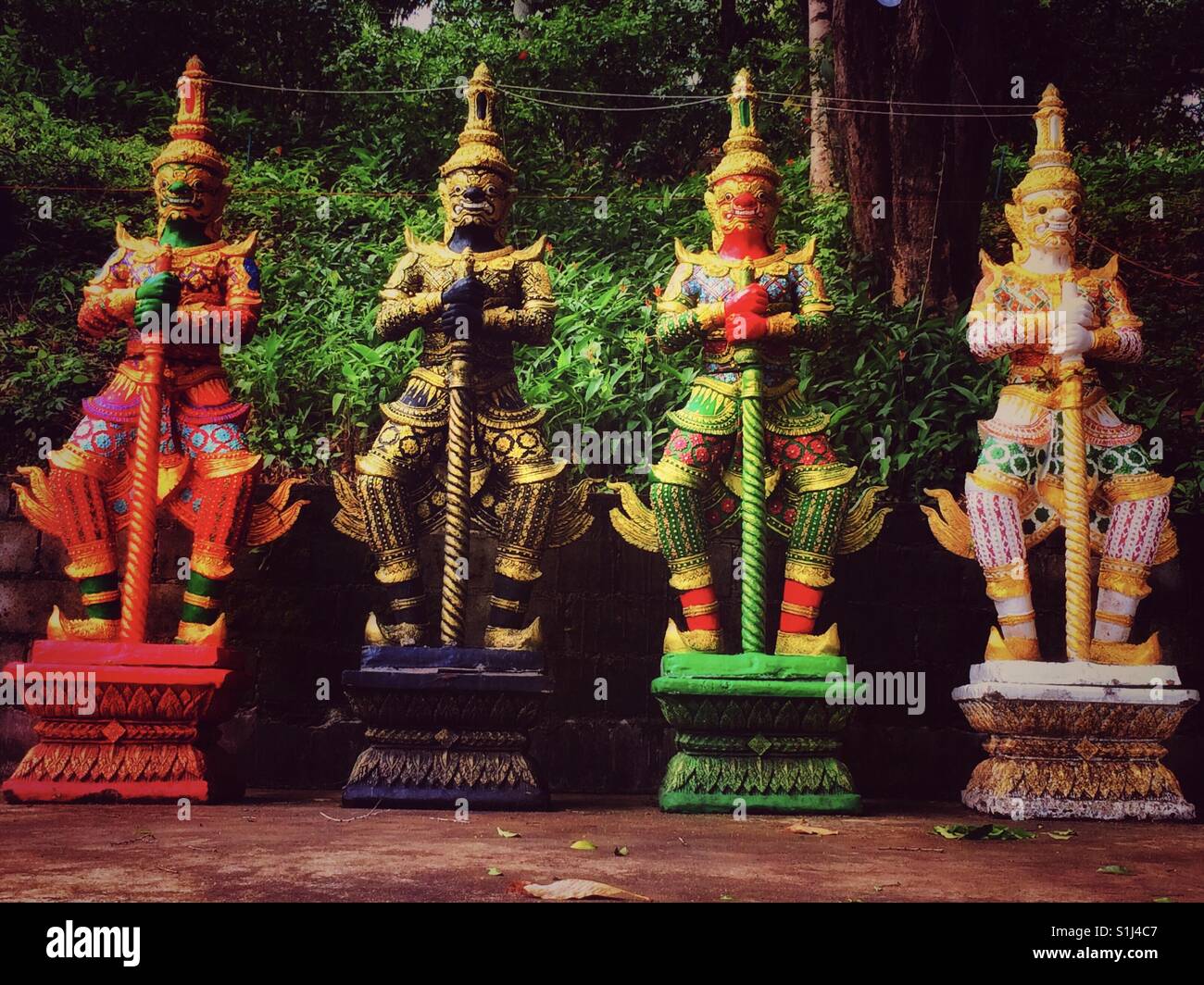 Guardians to a temple in Koh Phayam - Smartphone Captured Stock Image
