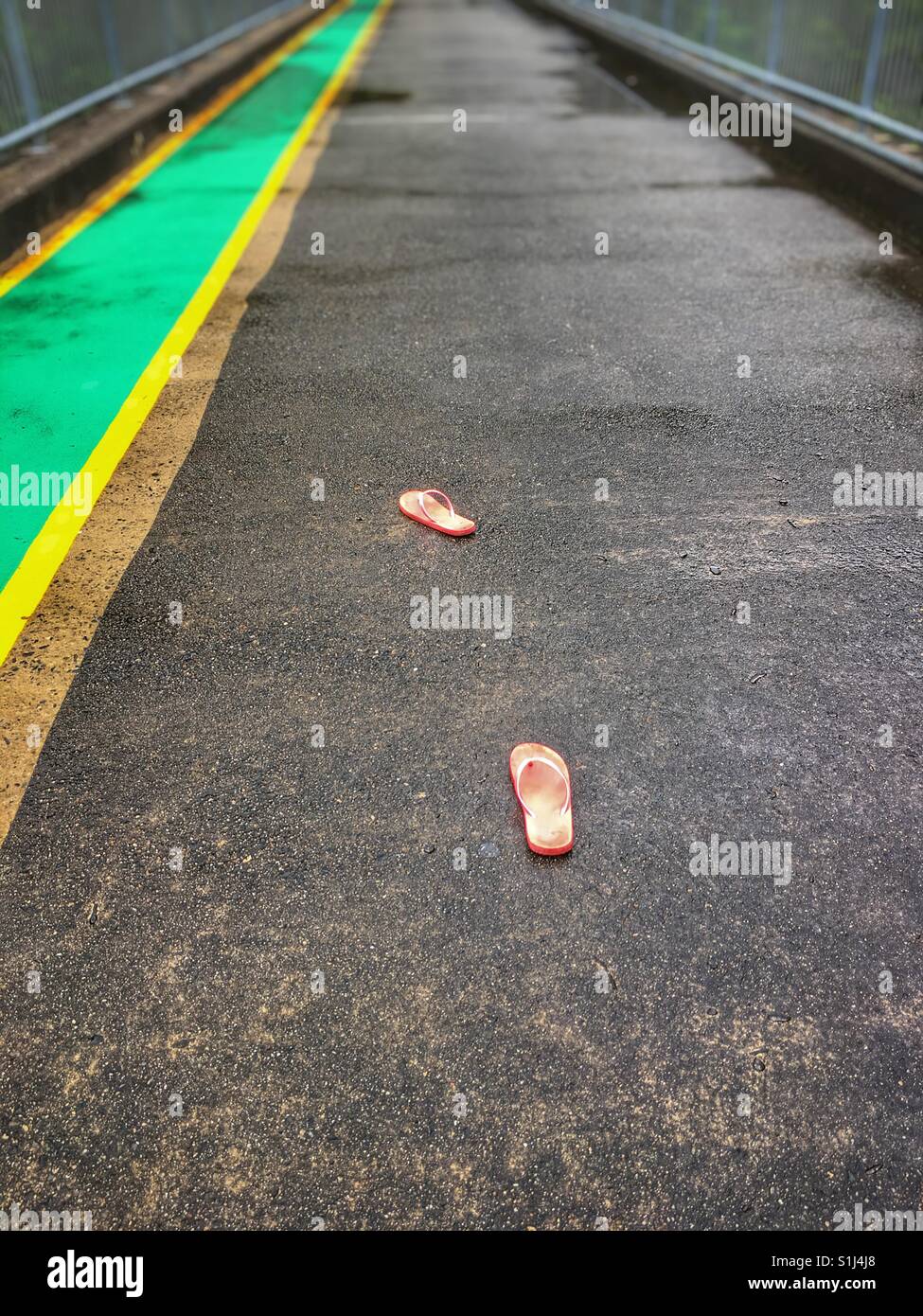 Lost flip flops on a bridge, Stock Photo