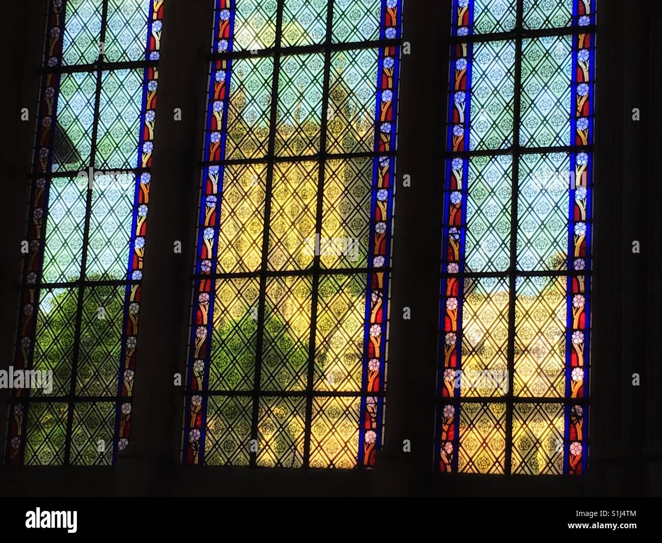 Wells Cathedral, seen through a stained glass leaded window of the