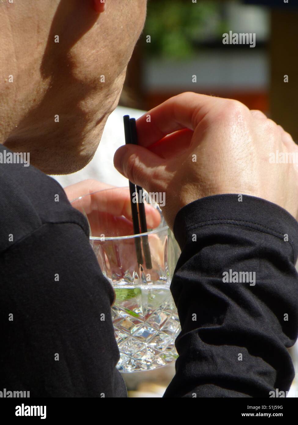 Drinking through straw hires stock photography and images Alamy