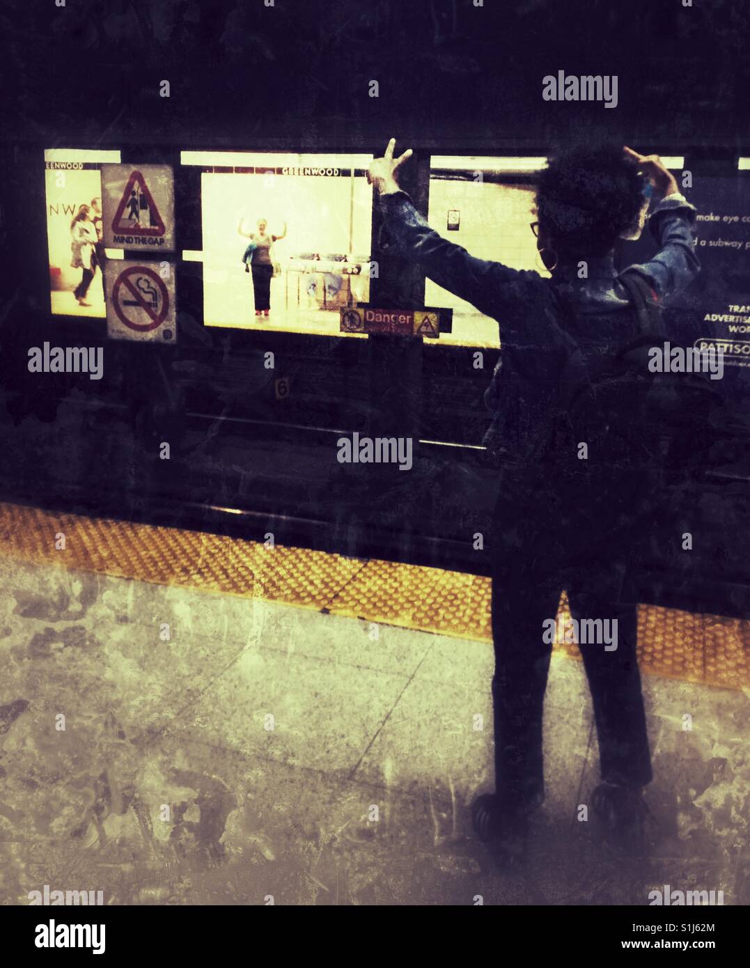 Friends waving across the train platform. - Smartphone Captured Stock Image