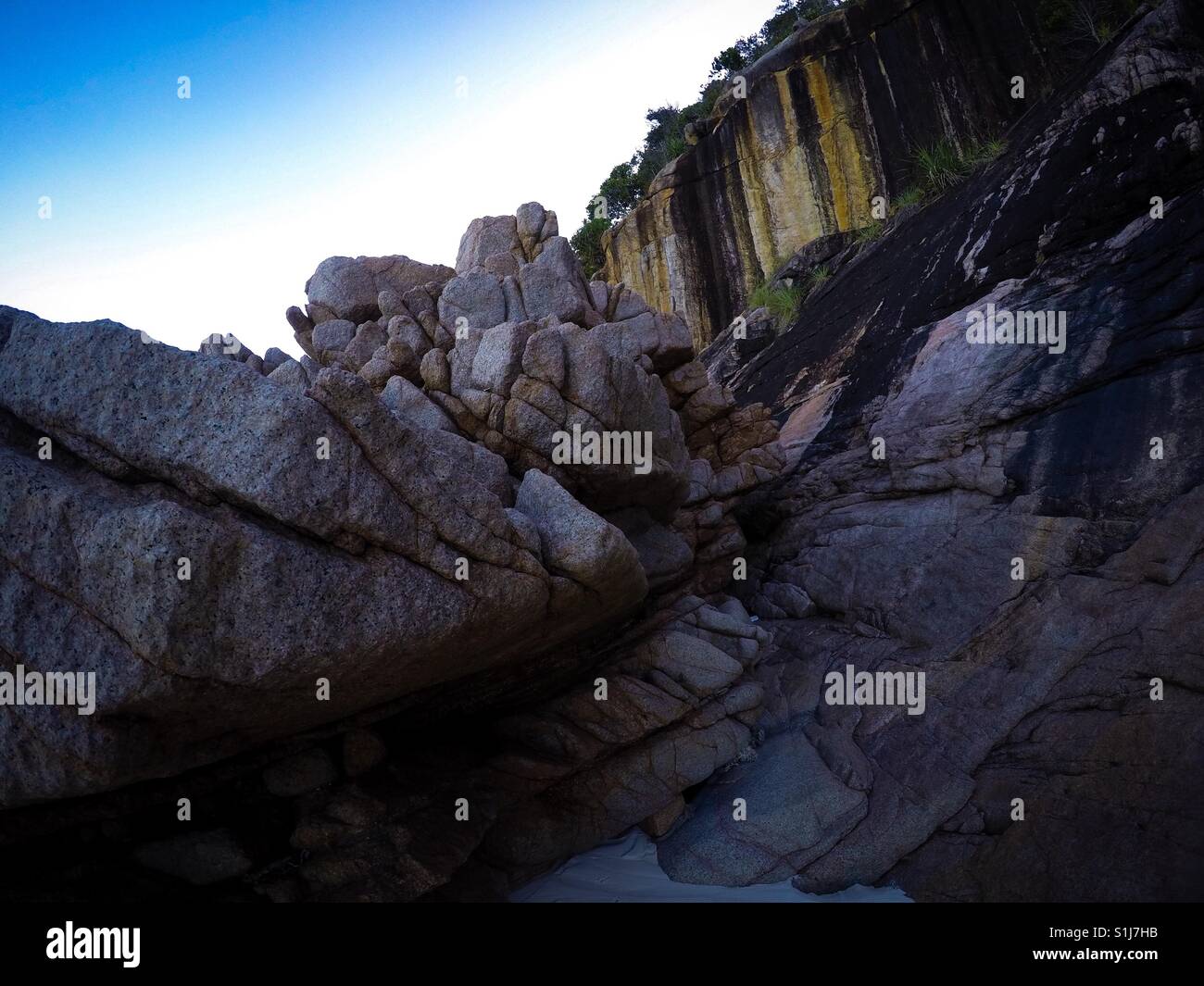 Impressive rock formations by the beach. Redang Island, Terengganu, Malaysia. Stock Photo