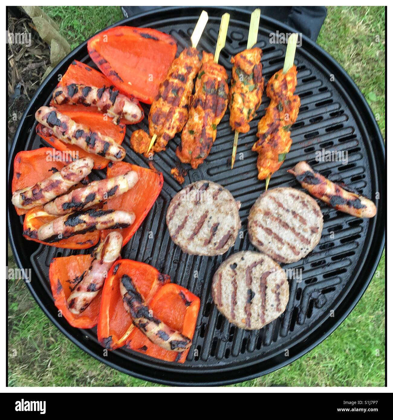 Cadac BBQ with food Stock Photo - Alamy