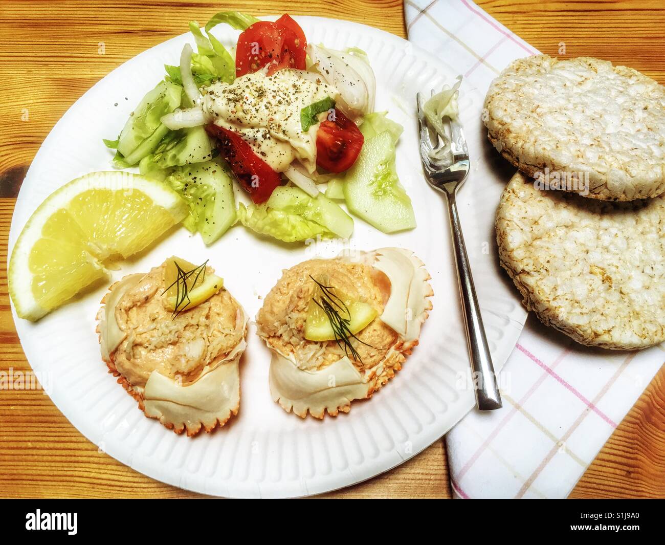 Dressed crab, salad and rice cakes - Smartphone Captured Stock Image