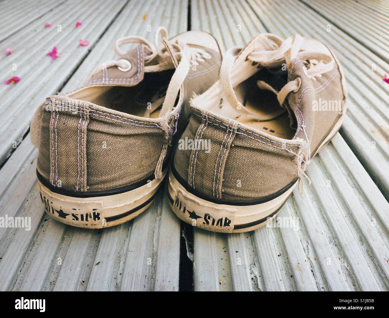 Worn out Converse sneakers Stock Photo