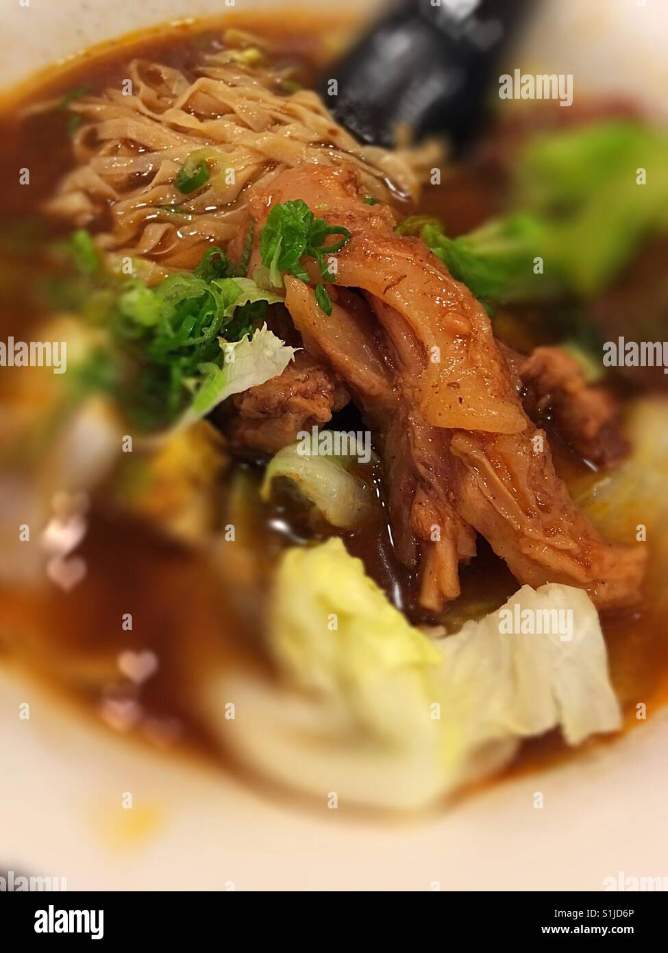The beef stew with noodle soup in Vietnamese-Chinese style Stock Photo