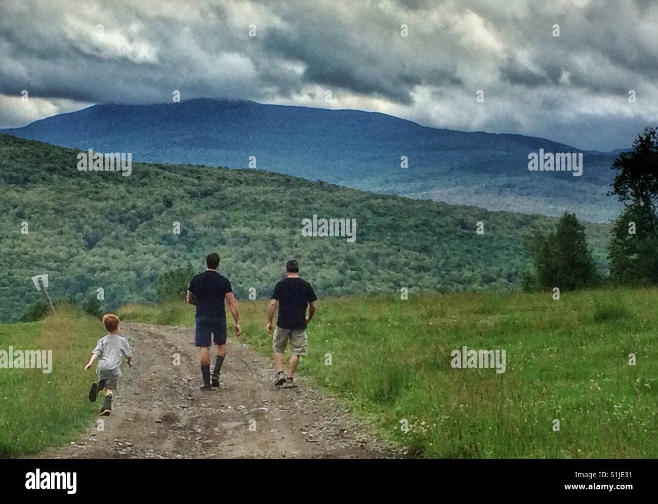 Family walking in countryside, Quebec. Stock Photo