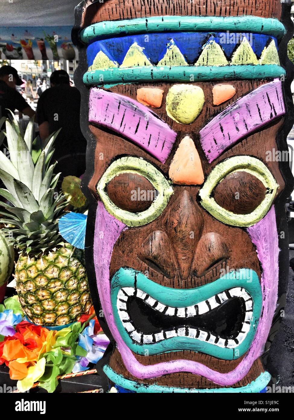 Colourful carved wooden face Stock Photo Alamy