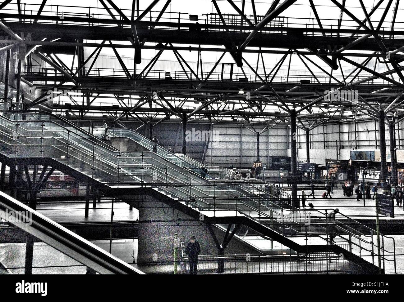 Leeds railway station, escalators to platforms. - Smartphone Captured Stock Image