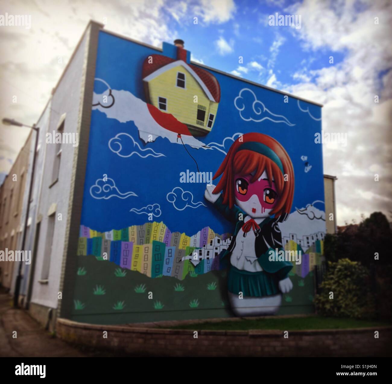 Street art on side of house in Bristol England - Smartphone Captured Stock Image