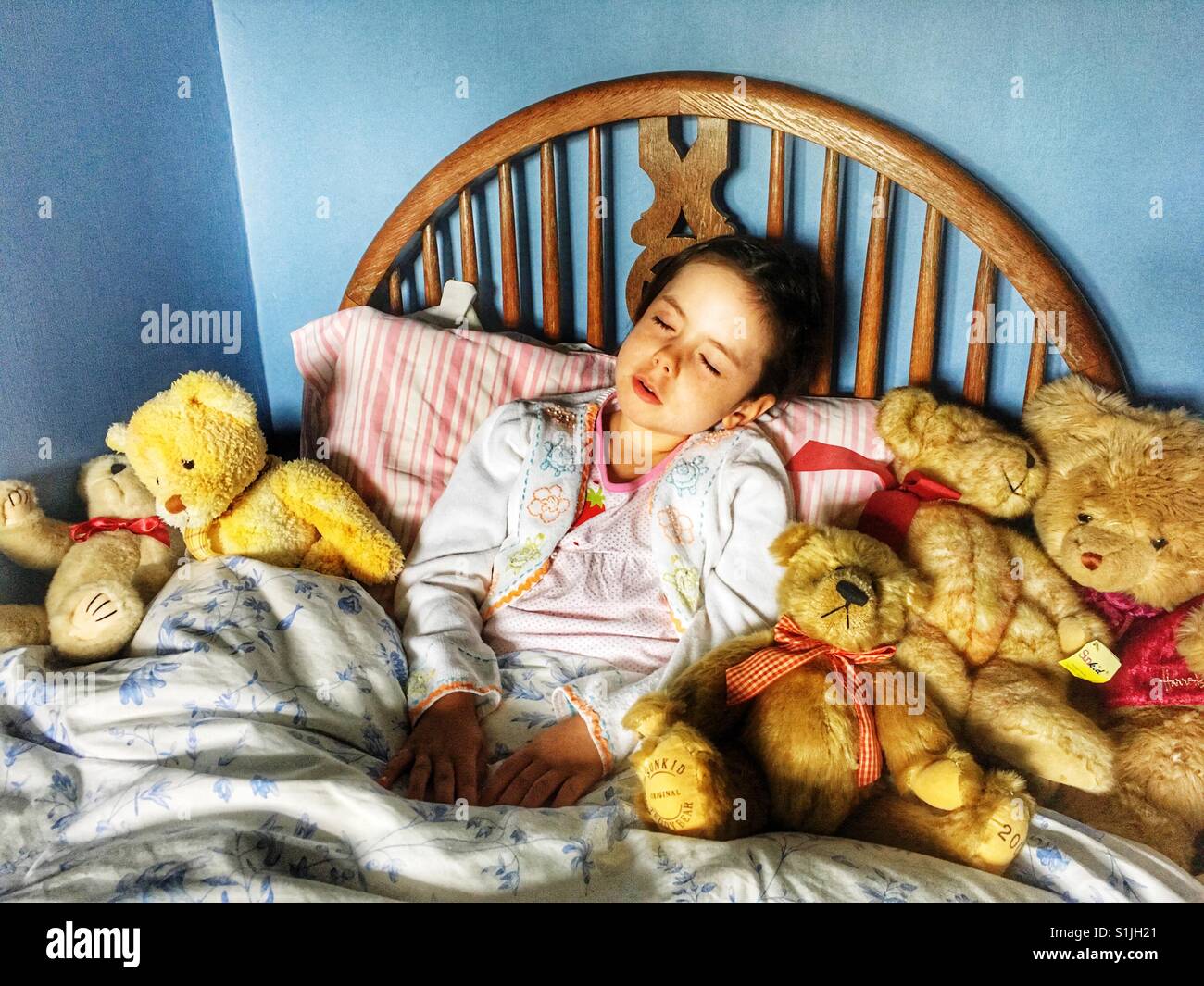 Child asleep in bed - Smartphone Captured Stock Image