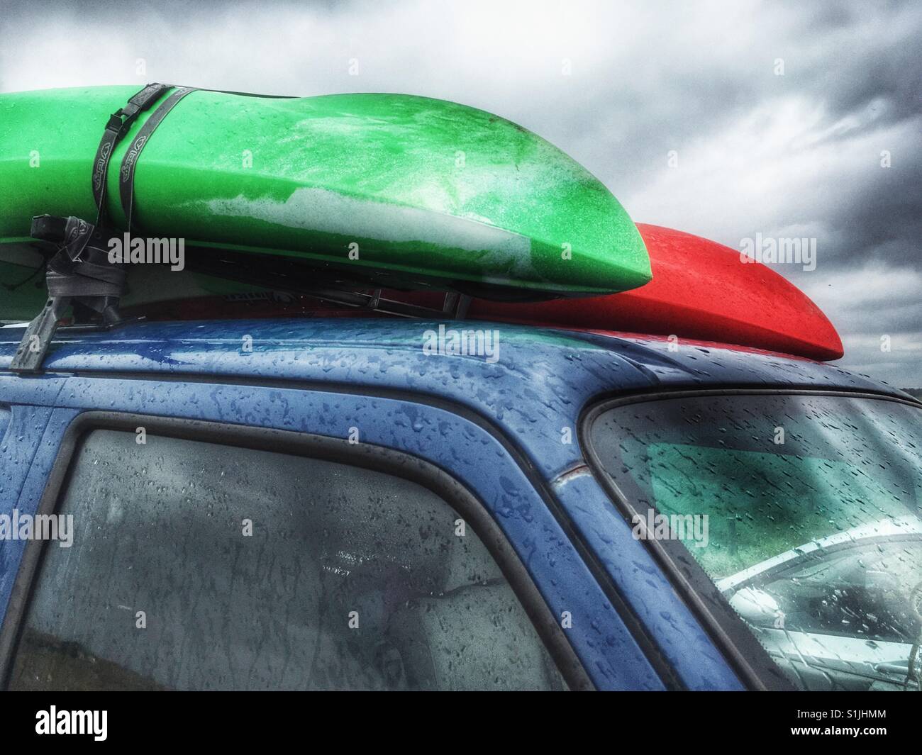 Canoes on top of van Stock Photo Alamy
