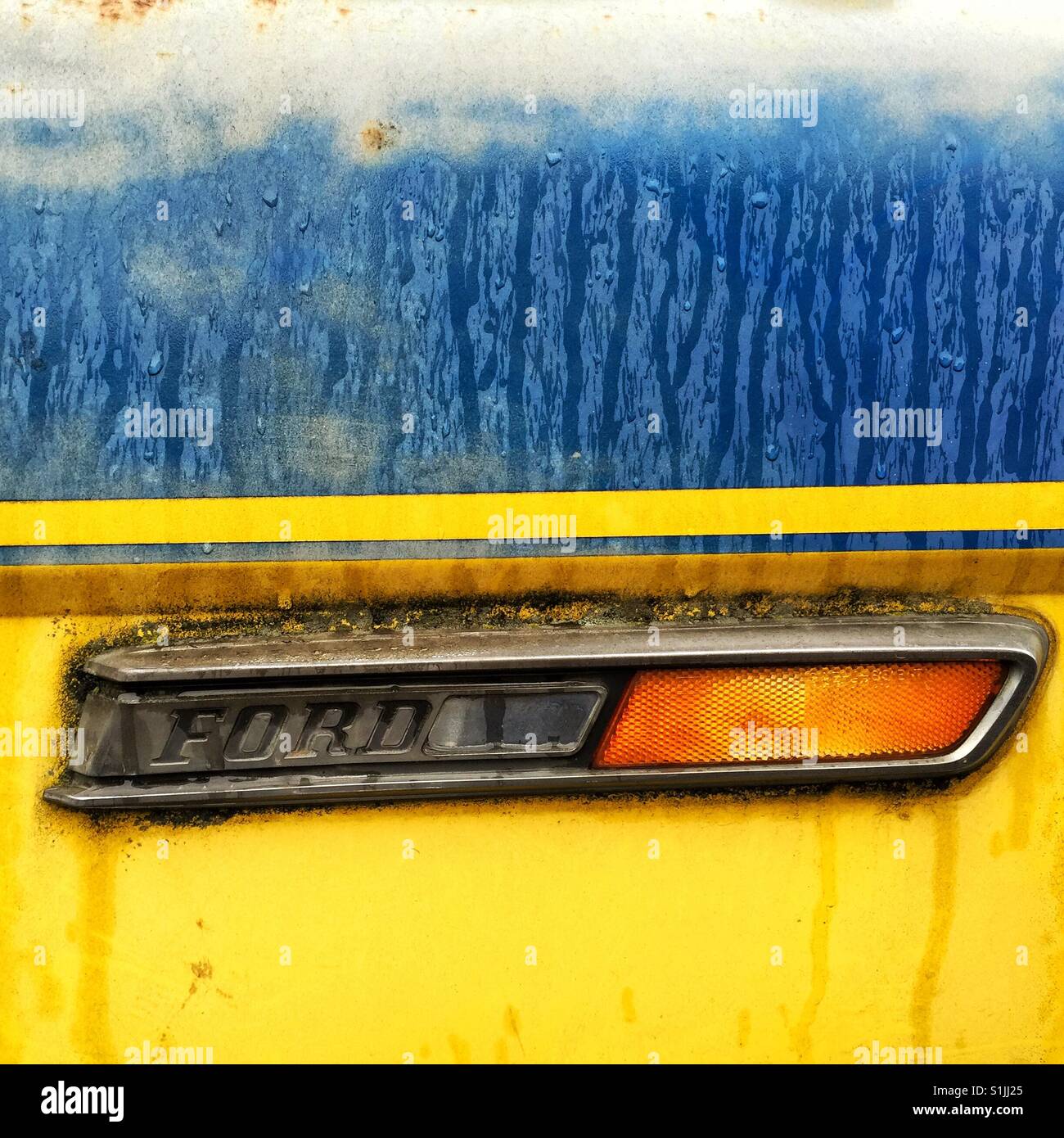 Detail of bright yellow vintage Ford truck Stock Photo
