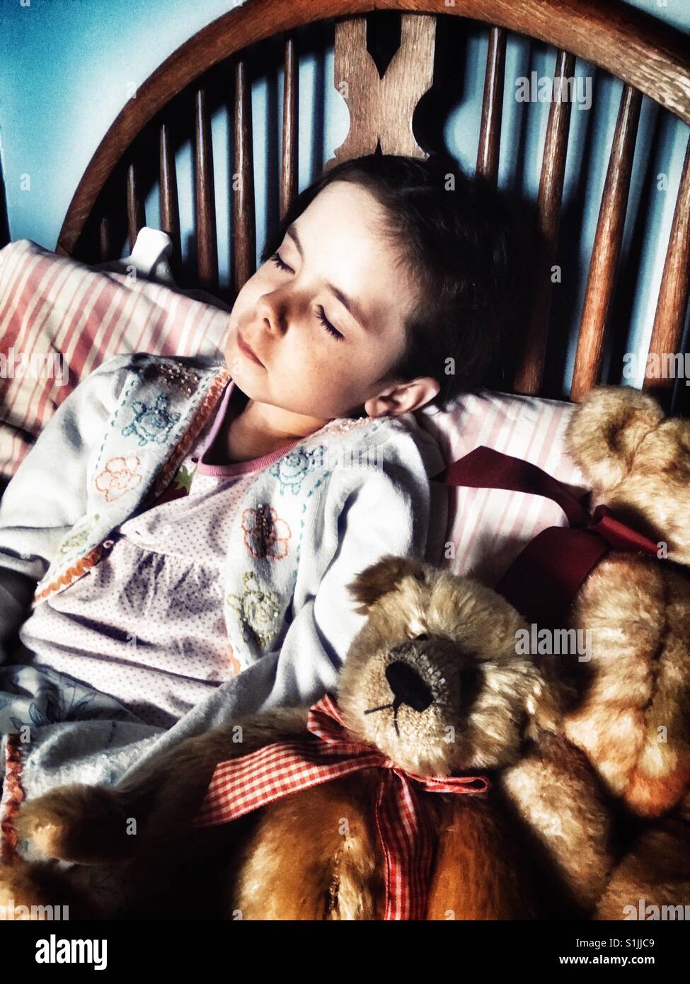 Girl asleep in bed hi-res stock photography and images - Alamy