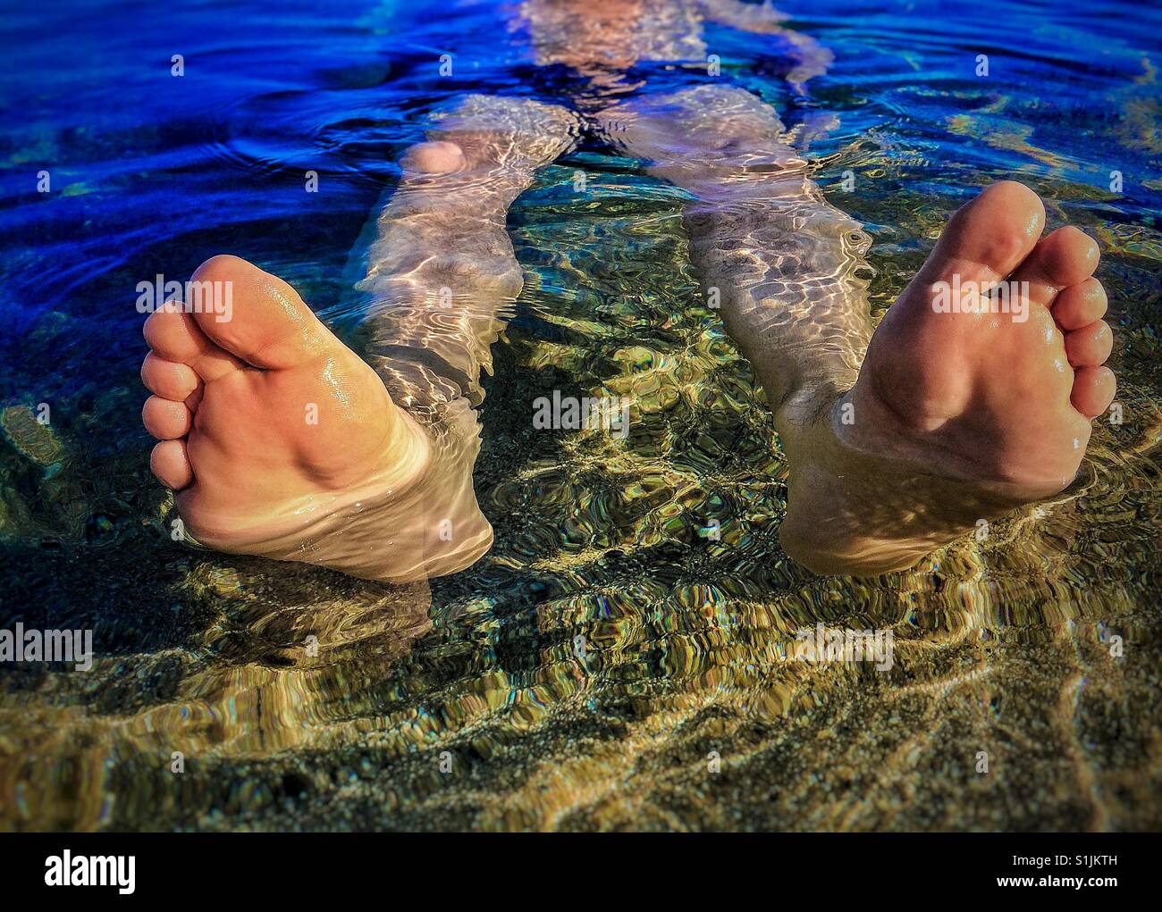 Feet relaxed on beach - Smartphone Captured Stock Image