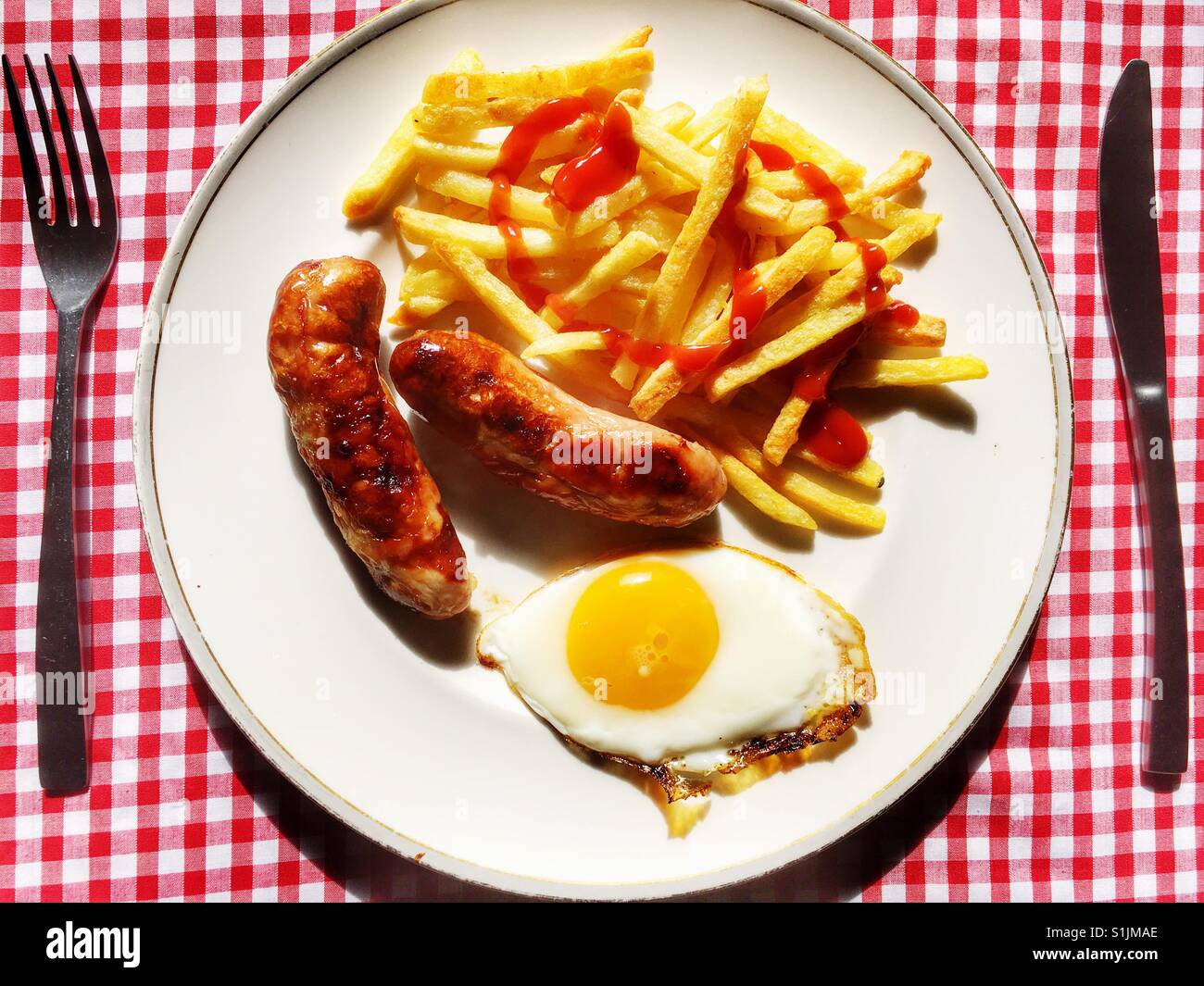 Sausage, egg and chips Stock Photo Alamy