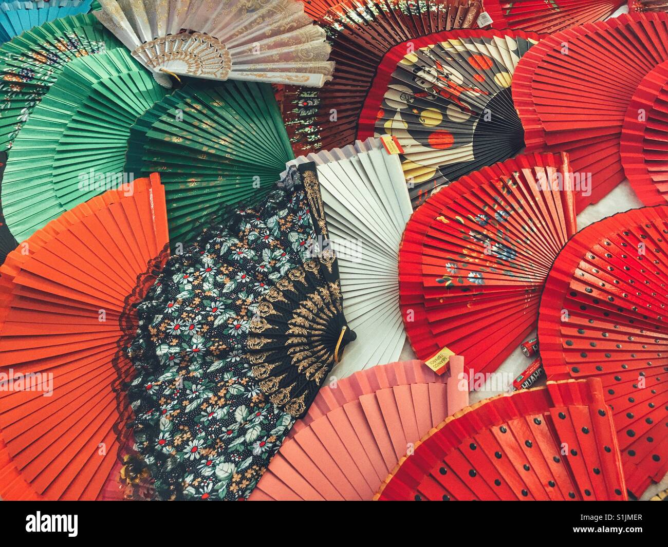 Display of fans in a Spanish market - Smartphone Captured Stock Image