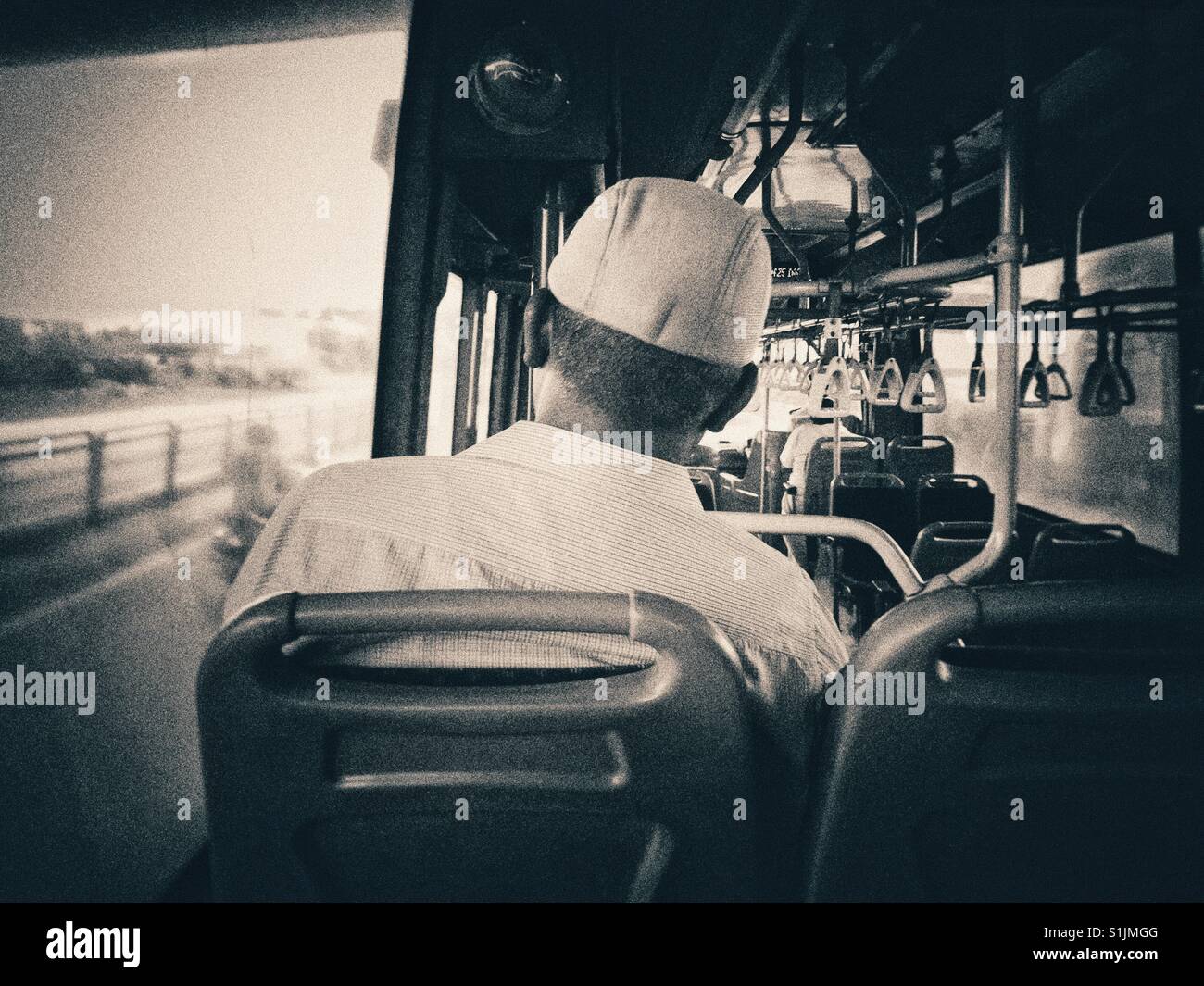 Person sitting inside a volvo bus Stock Photo