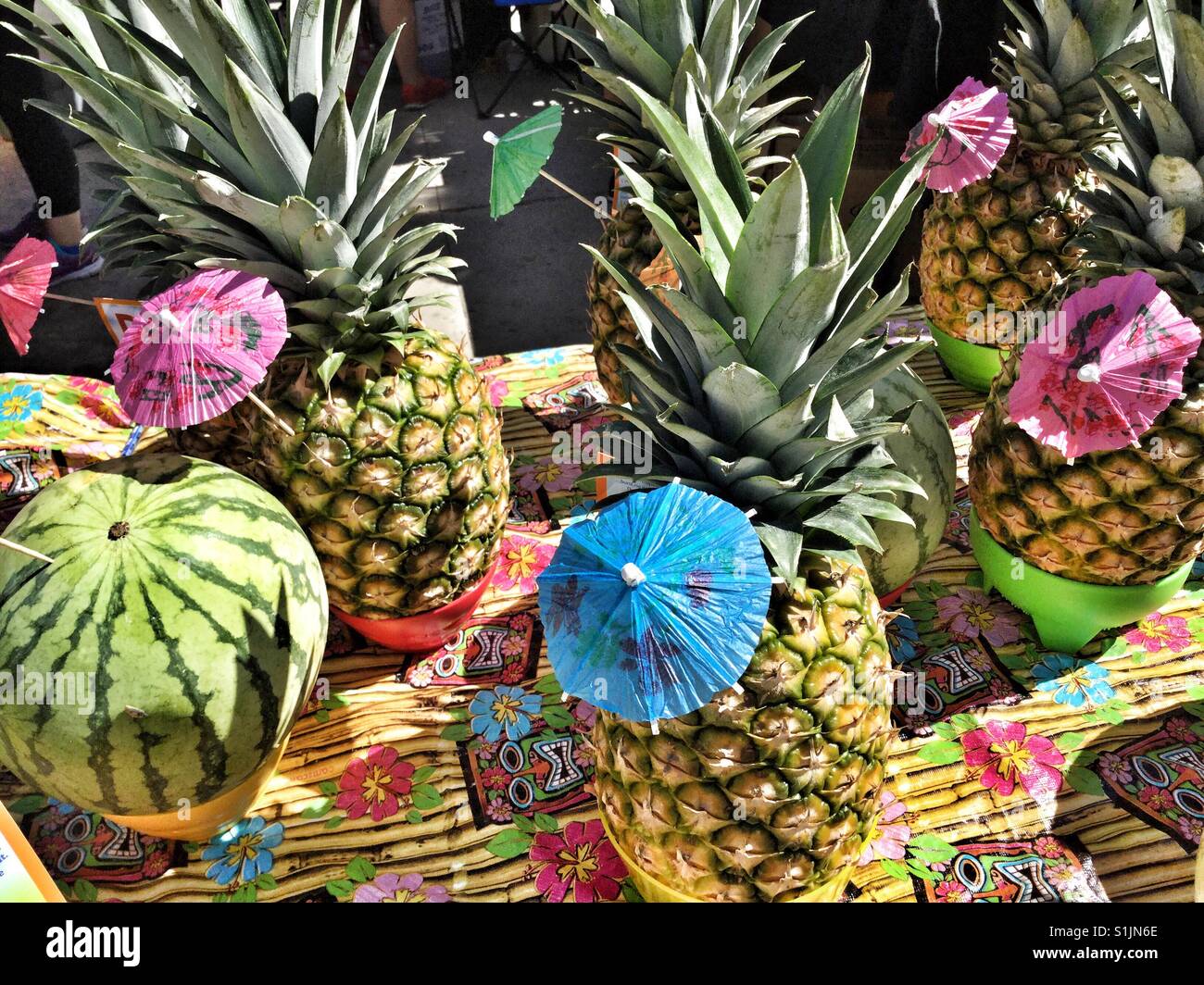 Pineapples and melons Stock Photo Alamy
