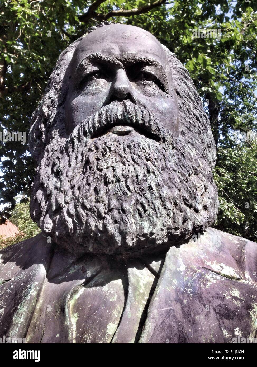 Karl Marx bust in the city of Neuruppin in Germany - Smartphone Captured Stock Image