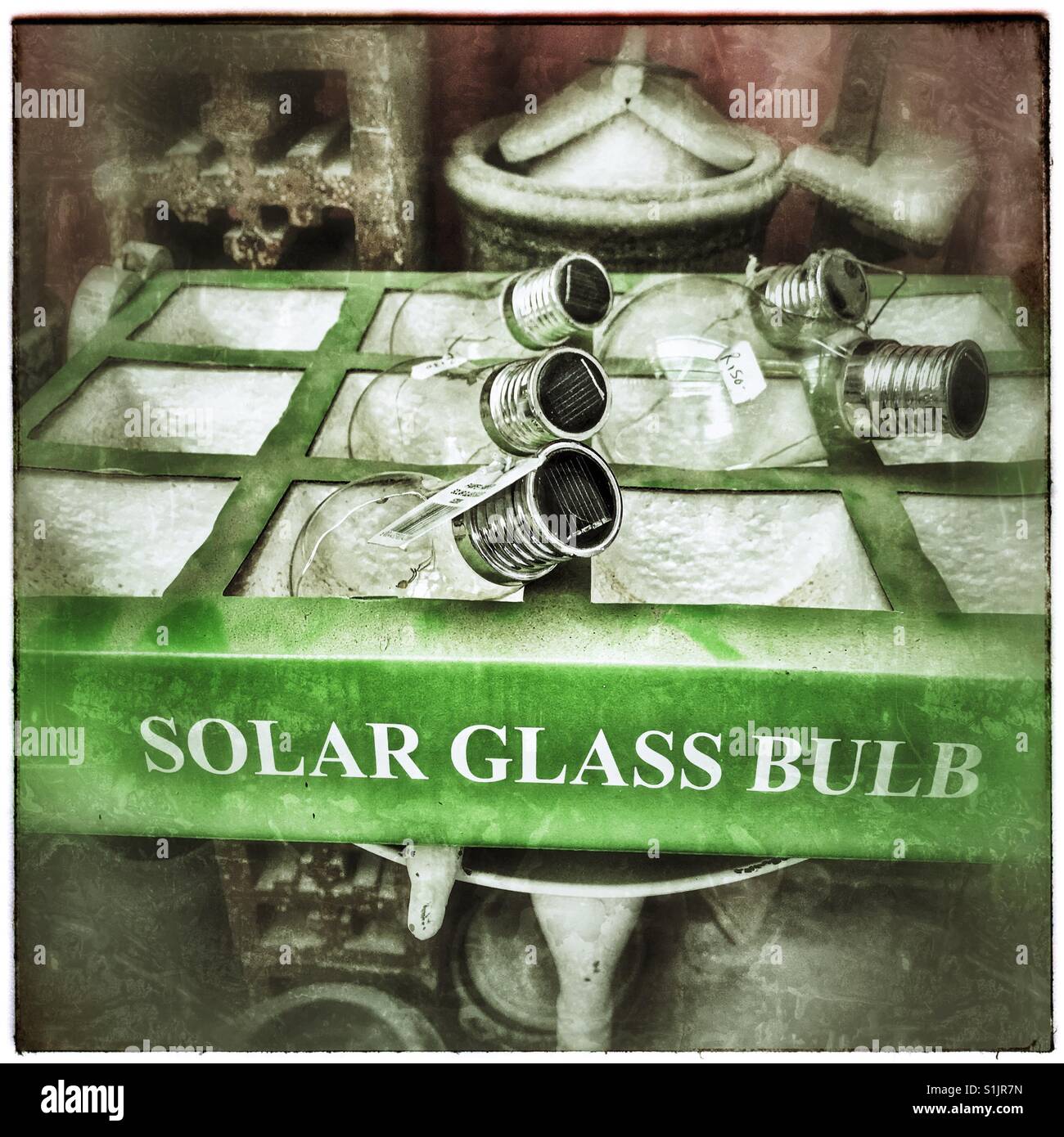 Solar glassbulbs on sale. - Smartphone Captured Stock Image
