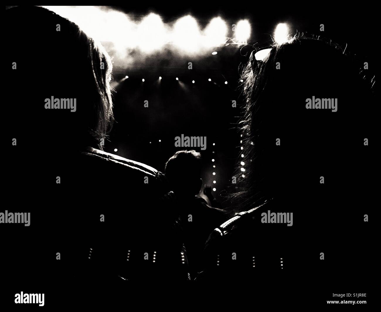 Audience at music concert, black and white photo. - Smartphone Captured Stock Image