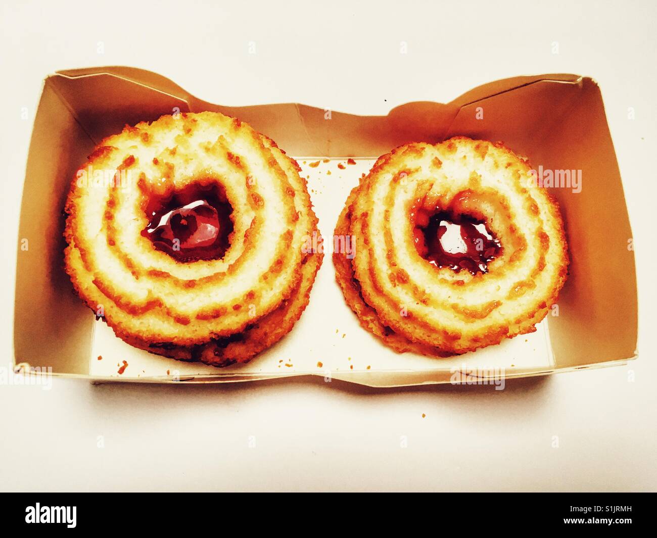 Mrs Crumble's jam coconut rings - Smartphone Captured Stock Image