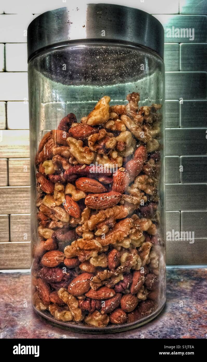Jar of mixed nuts Stock Photo - Alamy