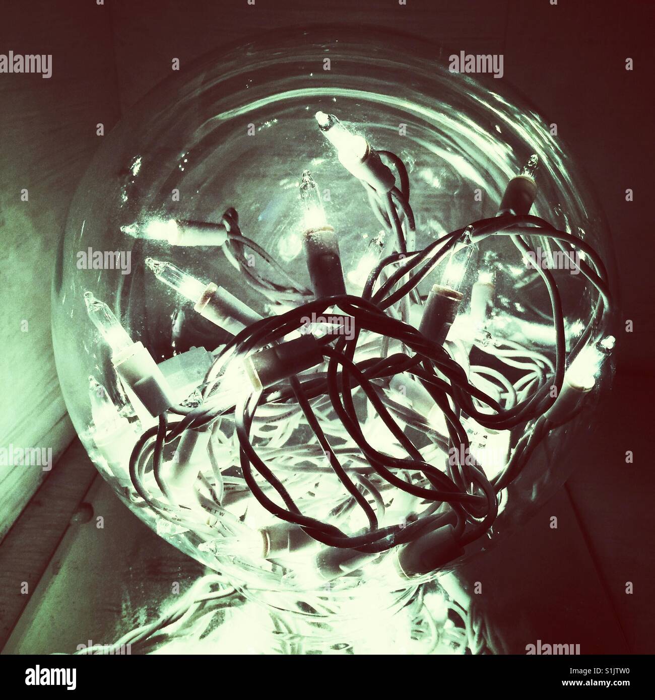 String of Christmas lights in the glass ball - Smartphone Captured Stock Image