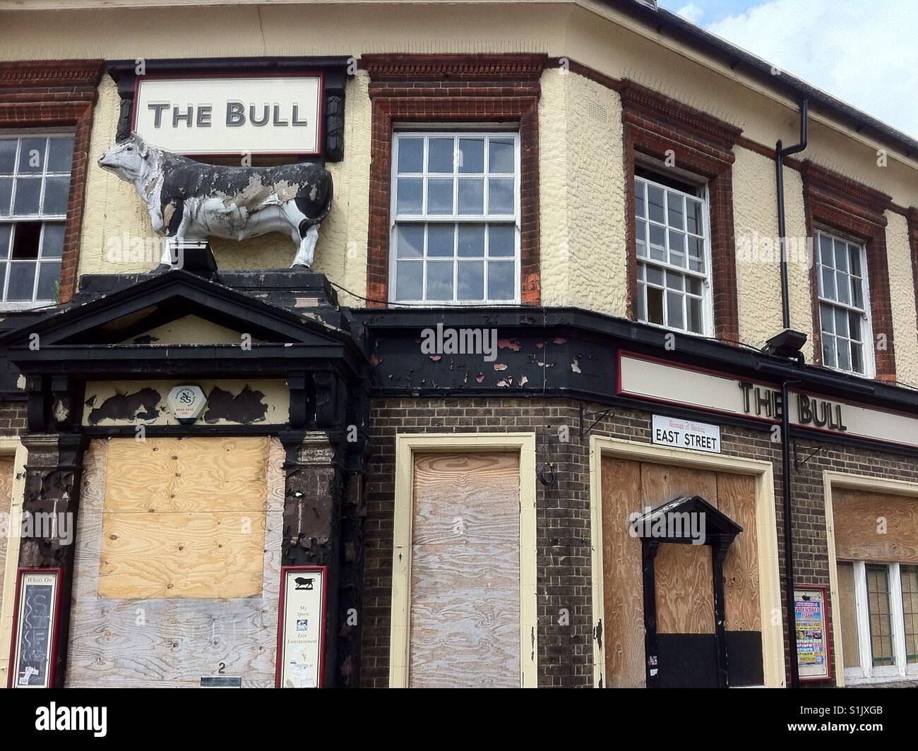 Old fashioned pubs, like the bull, have been closing at an alarming rate in London for several years. Barking town centre, London, uk. Stock Photo