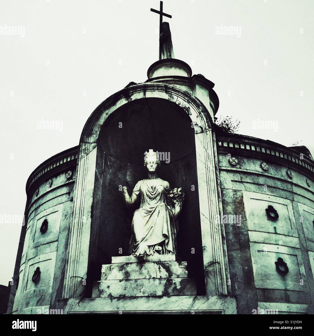 Statue in the tomb of the cemetery in New Orleans - Smartphone Captured Stock Image
