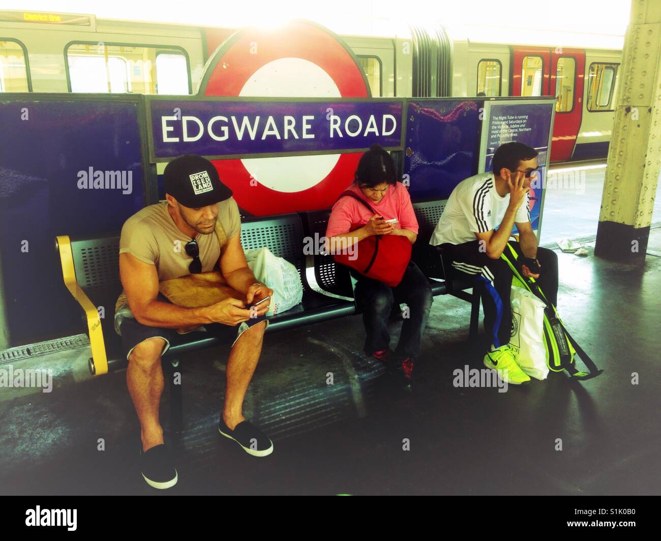 Sitting and waiting for a train at Edgeware Road. - Smartphone Captured Stock Image