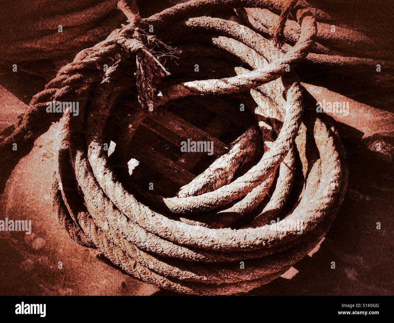Coil of old rope Stock Photo Alamy