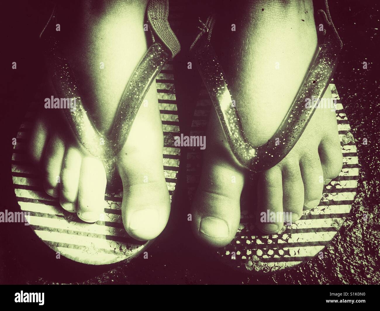 Flip flops feet child hi-res stock photography and images - Alamy