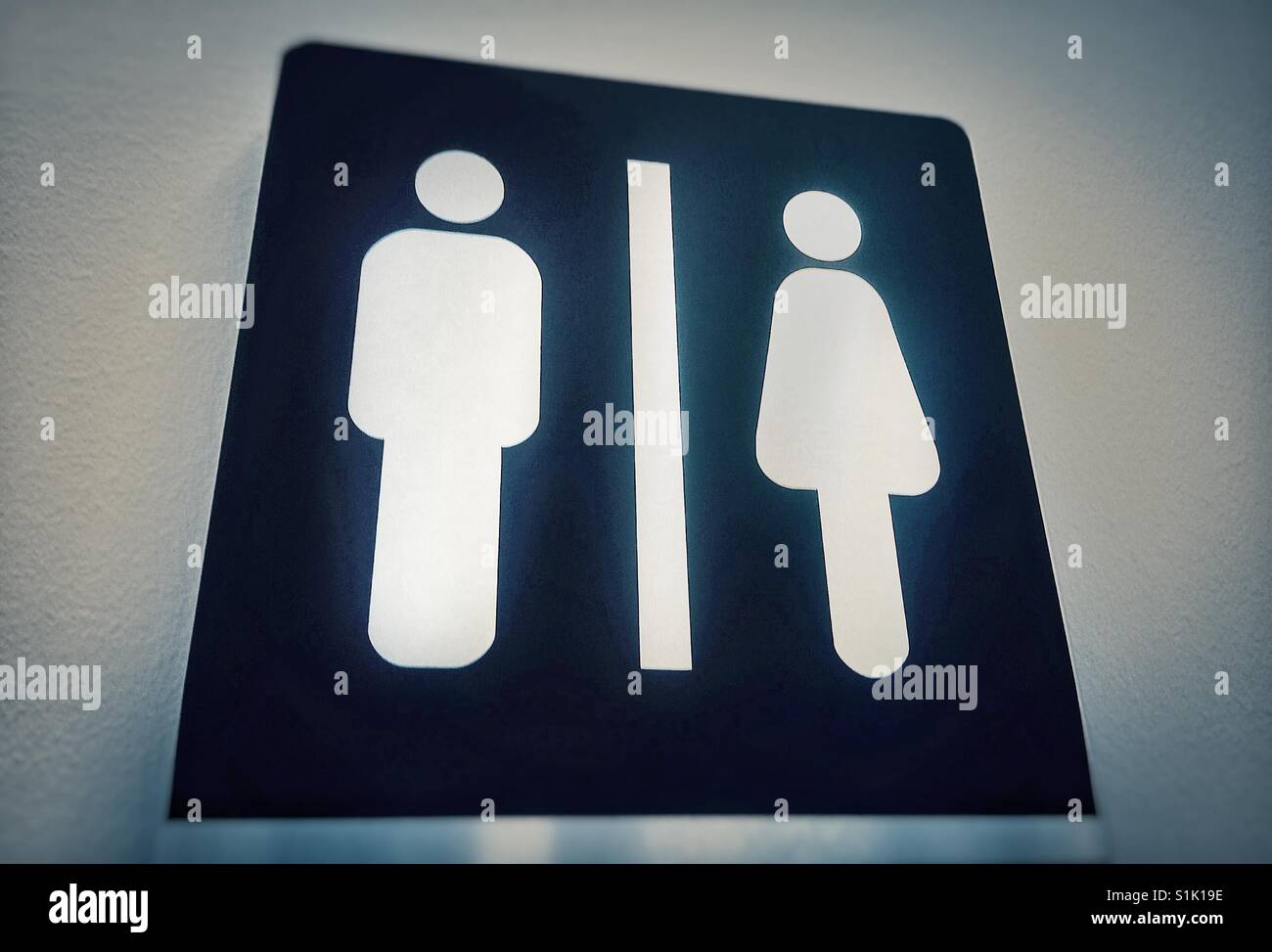 A sign showing male and female characters - Smartphone Captured Stock Image