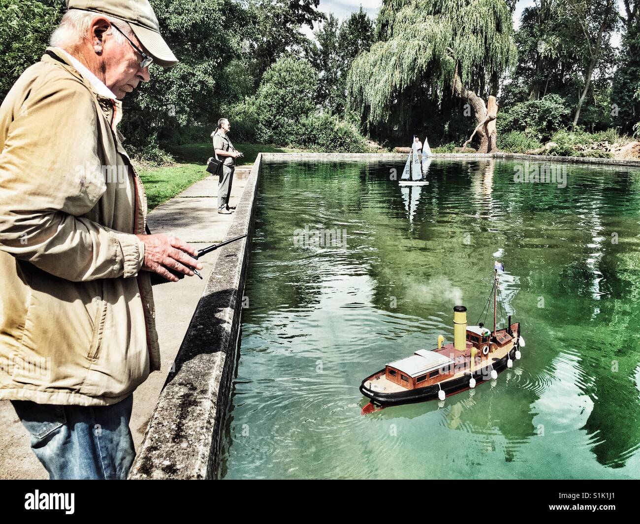 Model boat enthusiasts - Smartphone Captured Stock Image