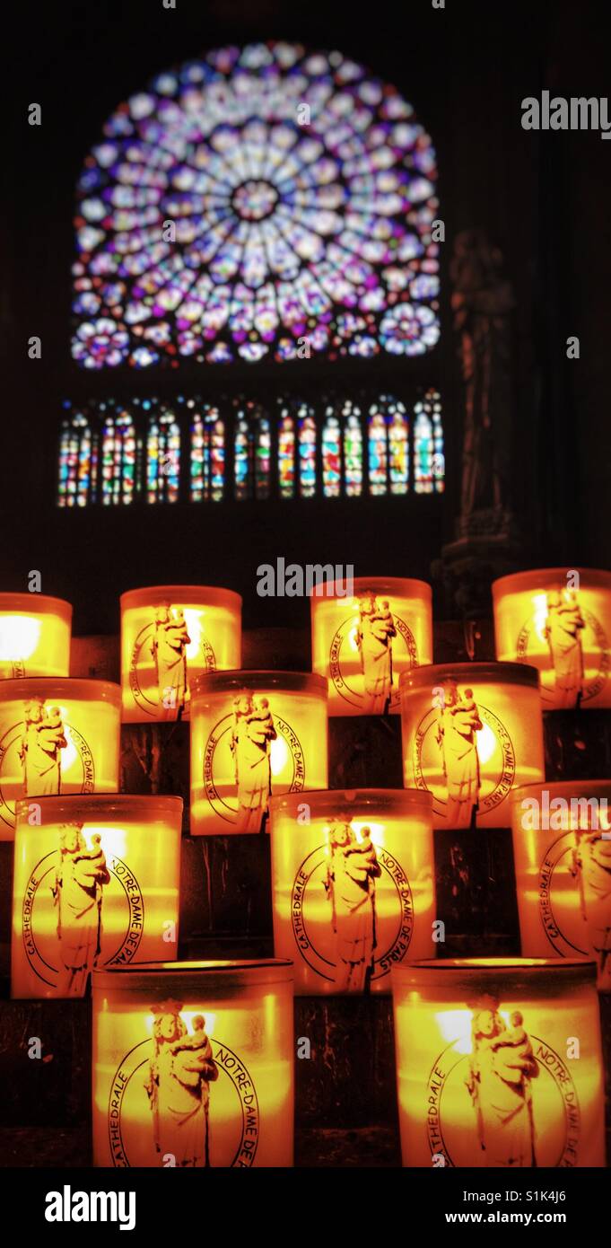 Candles and stained glass in Notre Dame Basilica Stock Photo - Alamy