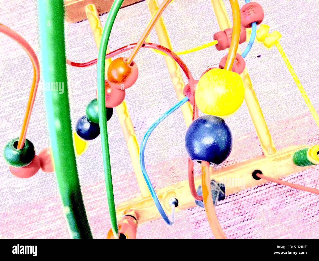 Wooden beads on wire toy Stock Photo Alamy
