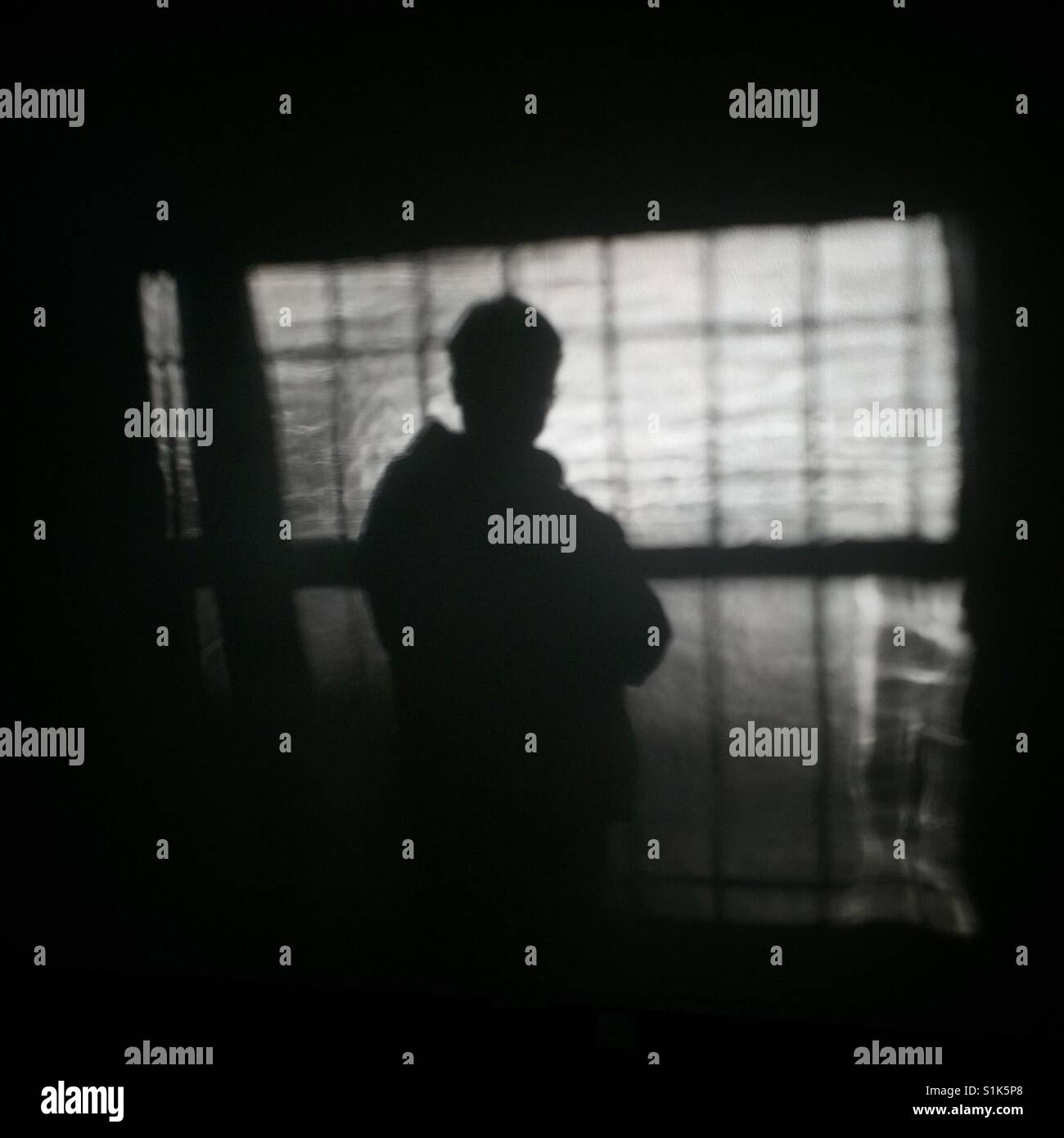 Pensive shadowy silhouette - Smartphone Captured Stock Image
