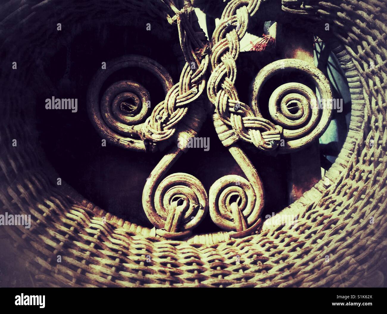 Spiral detail of antique wicker baby carriage - Smartphone Captured Stock Image