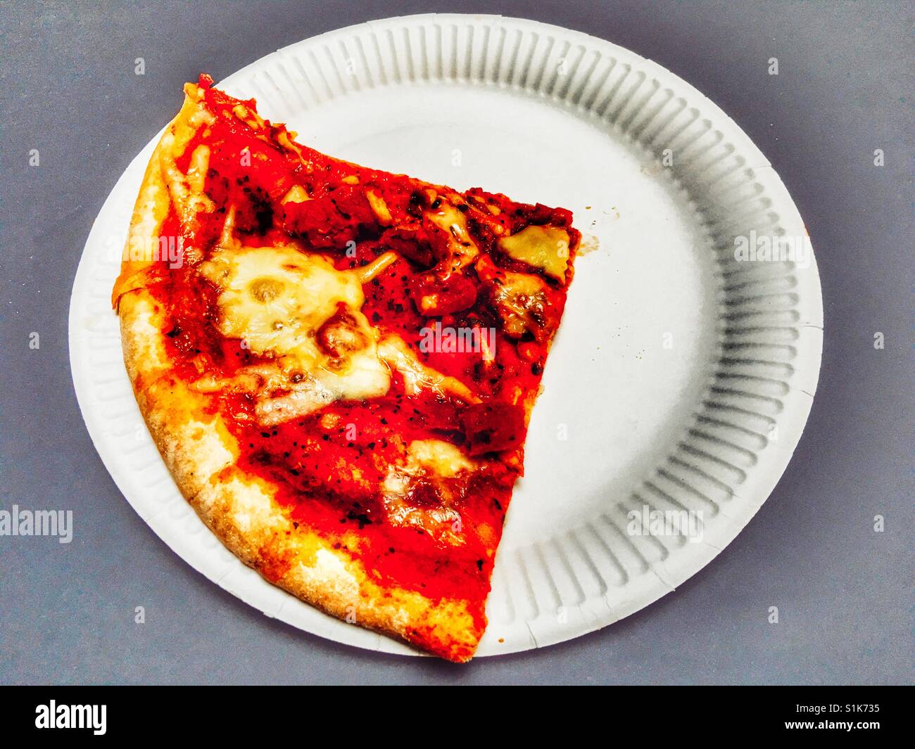 Slice of stone baked margherita pizza - Smartphone Captured Stock Image