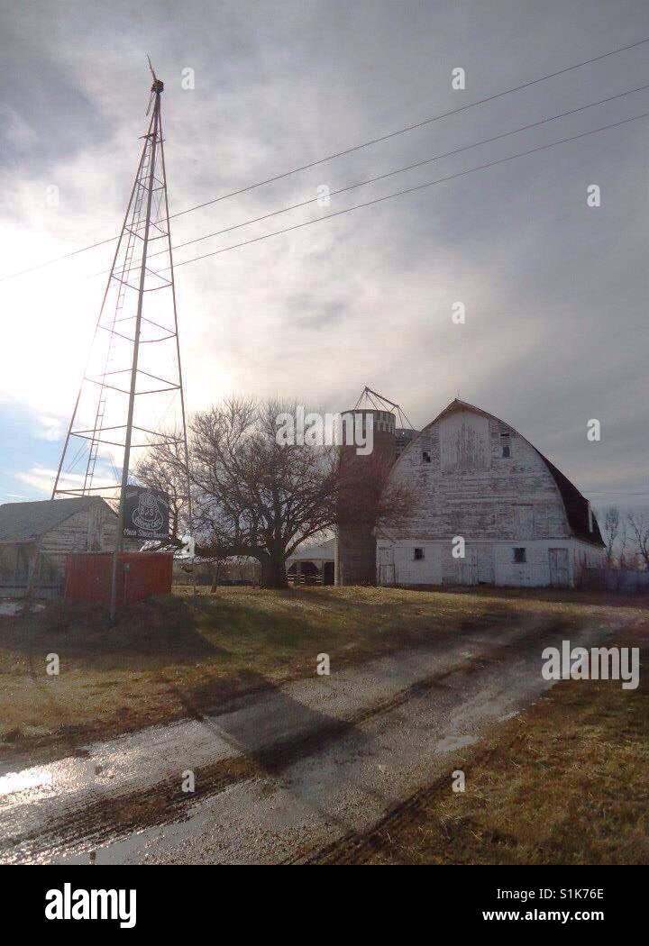 Iowa farm with windmill tower and barn - Smartphone Captured Stock Image