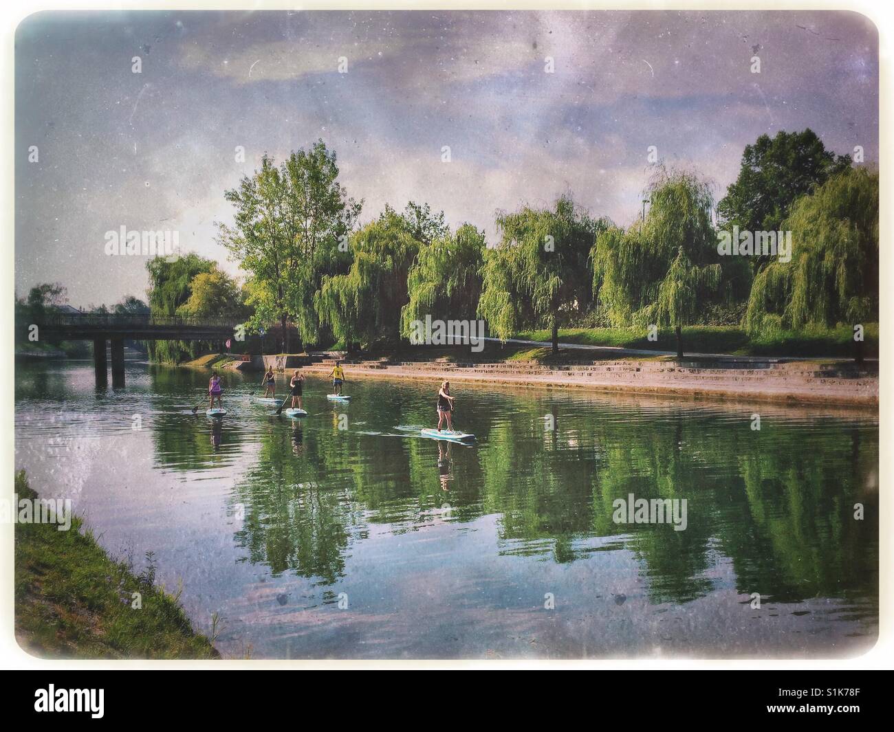 Stand up paddle boarding hires stock photography and images Alamy