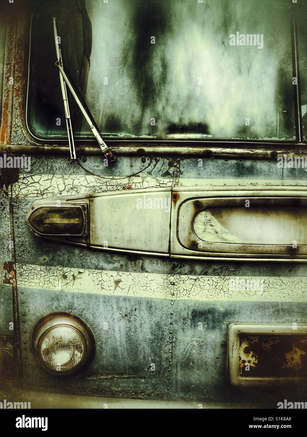 Front view of a rusty old abandoned bus Stock Photo - Alamy